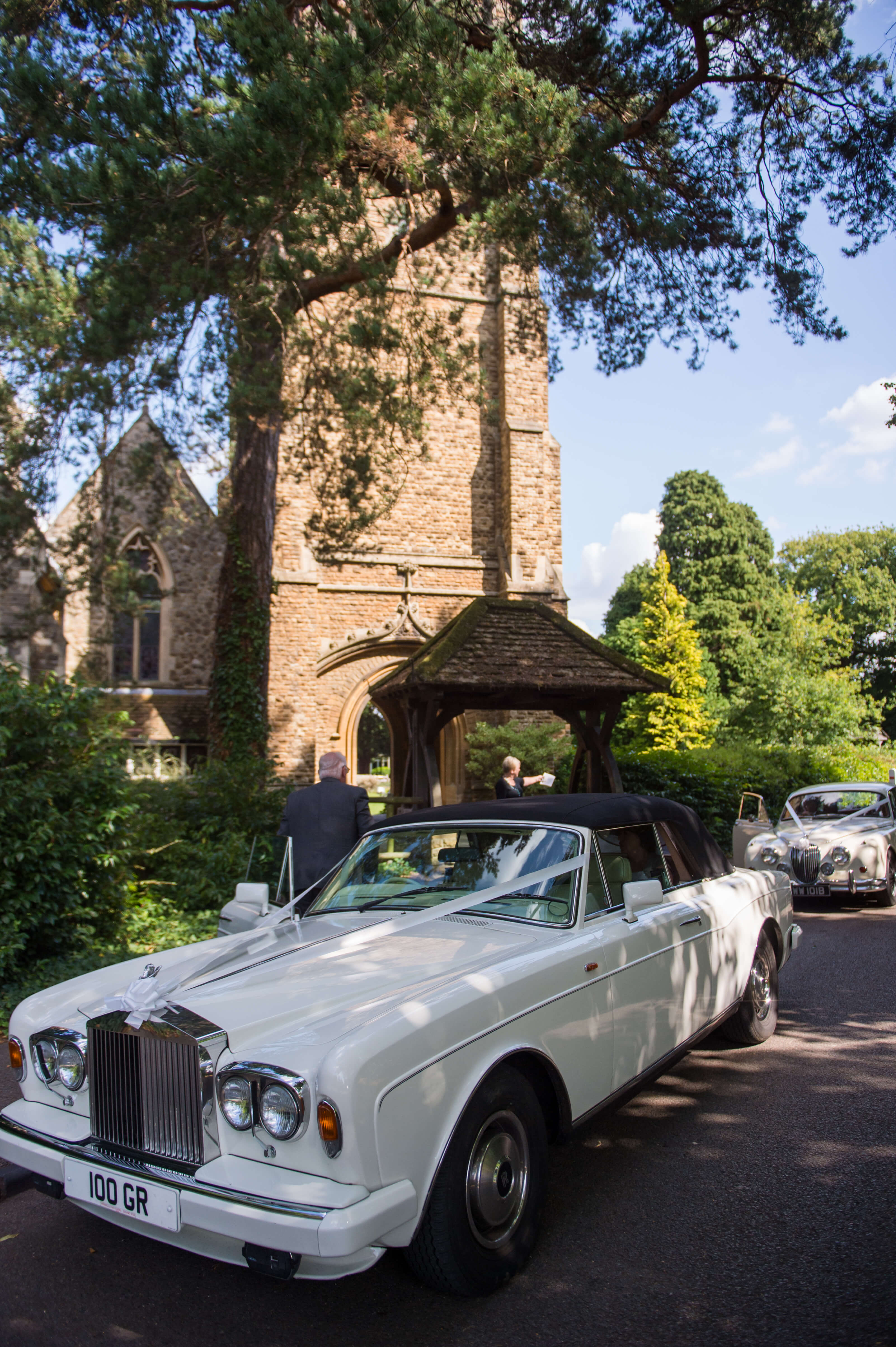 bridal car arriving at the church before the reception at botleys mansion